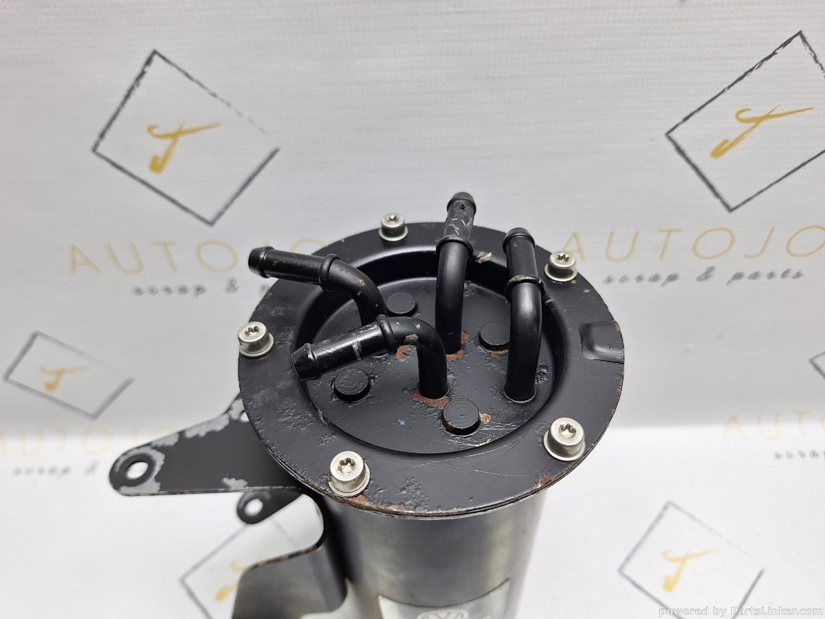 Carcasa filtru motorina SEAT LEON II (1P1) [ 2005 - 2013 ] TDI (BKC, BLS, BXE) 77KW|105HP 3C0127400B