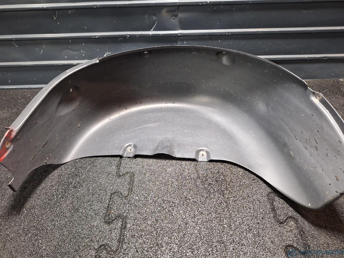 Carenaj roata stanga spate VOLKSWAGEN CADDY III Estate (2KB, 2KJ, 2CB, 2CJ) [ 2004 - 2015 ] TDI (BJB, BLS) 77KW|105HP OEM 2K0810971A