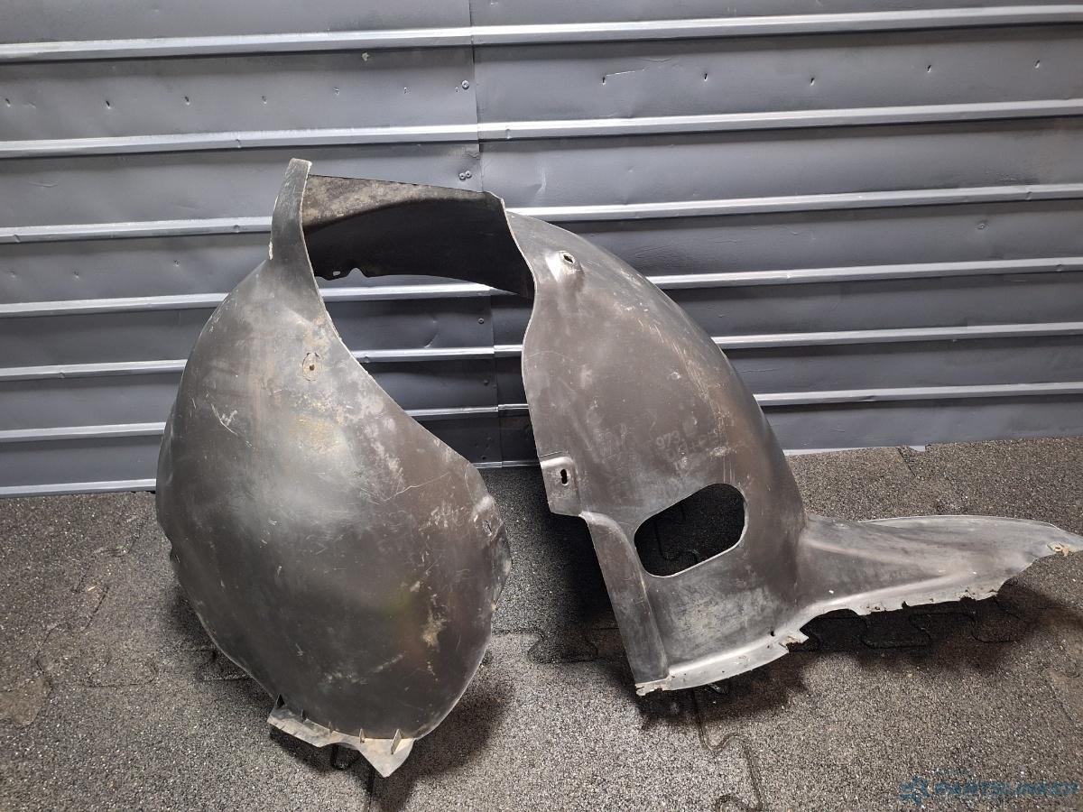 Carenaj roata stanga fata VOLKSWAGEN TOURAN (1T1, 1T2) [ 2003 - 2010 ] TDI (BMN) 125KW|170HP OEM 1T0805973L