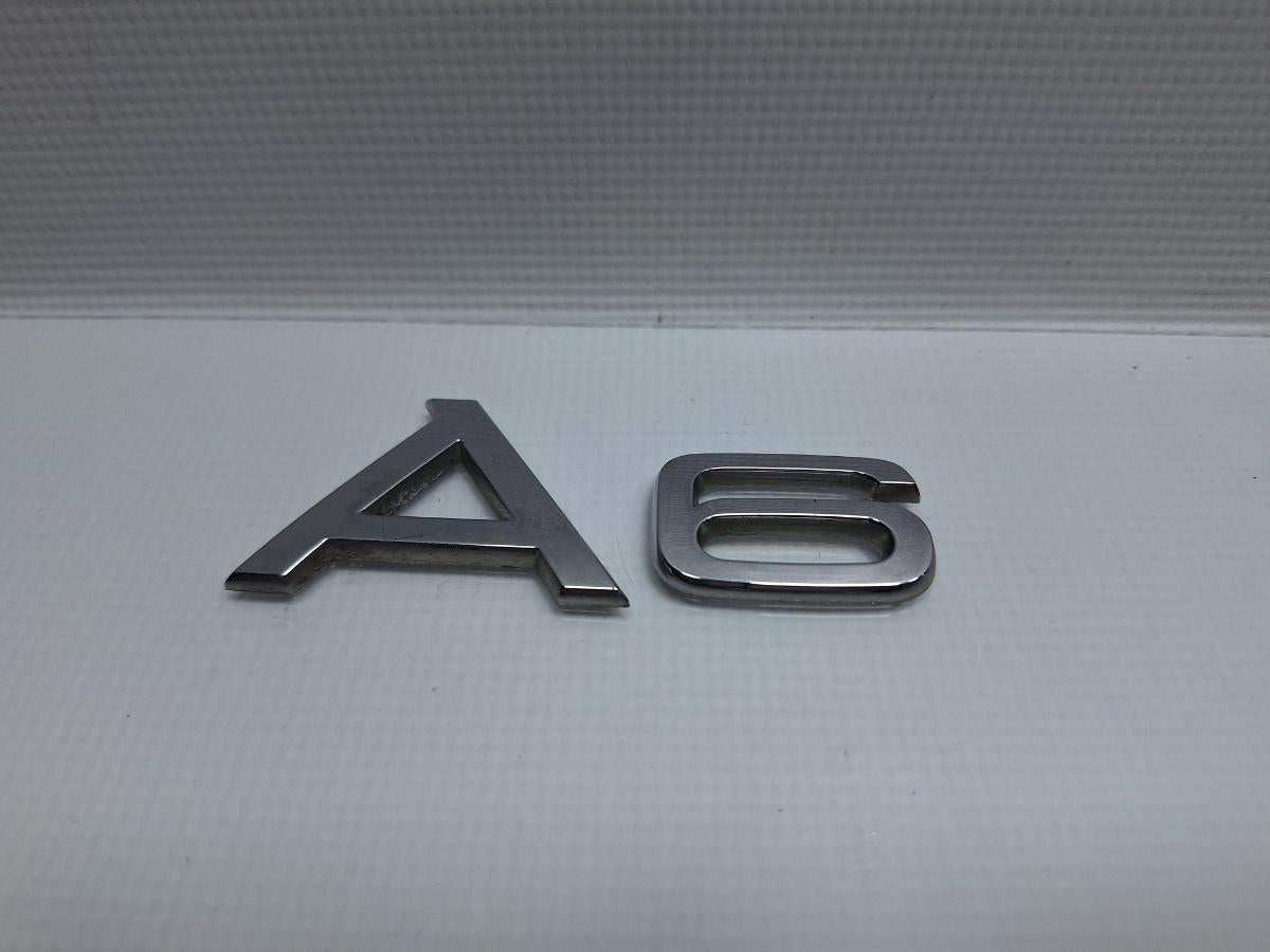 Logo haion AUDI A6 III Allroad (4FH, C6) [ 2006 - 2011 ] TDI quattro (CANC) 140KW|190HP OEM 8H0853737