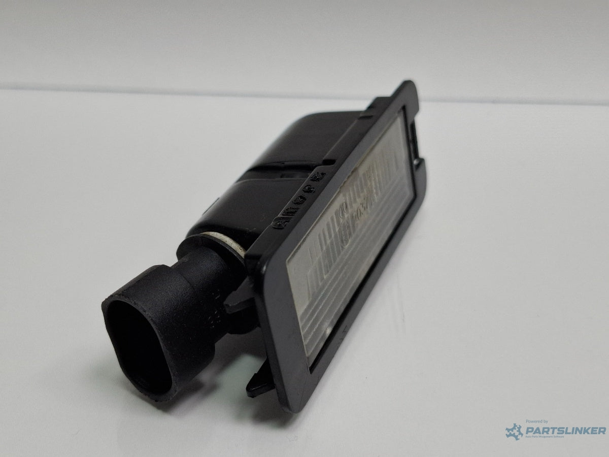 Lampa numar inmatriculare VOLKSWAGEN FOX 5Z1, 5Z3 2003 - 2014 1.2 1.2 BMD, CHFB 5X0943021