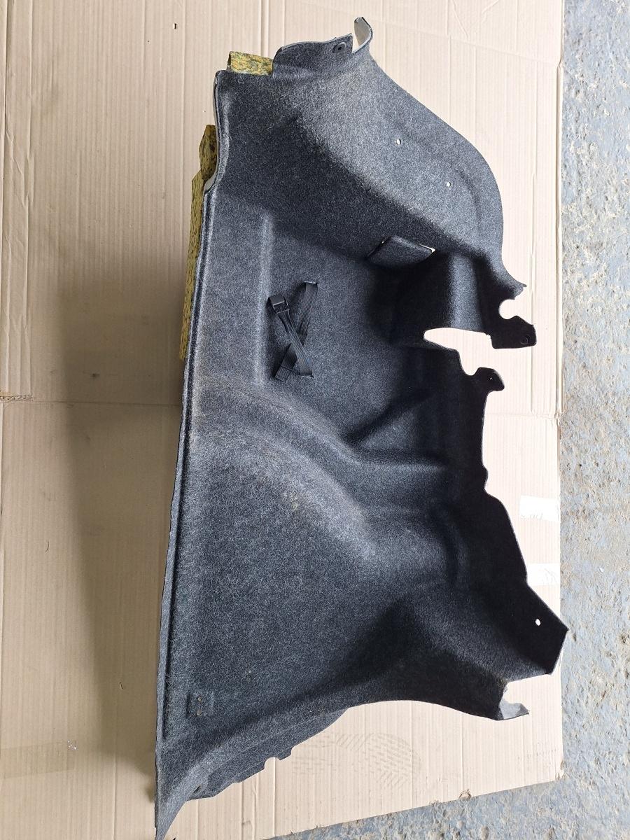Panou capitonaj lateral portbagaj stanga VOLKSWAGEN JETTA IV 162, 163, AV3, AV2 2009 -> 1.2 TSI CBZB 5C6867427M