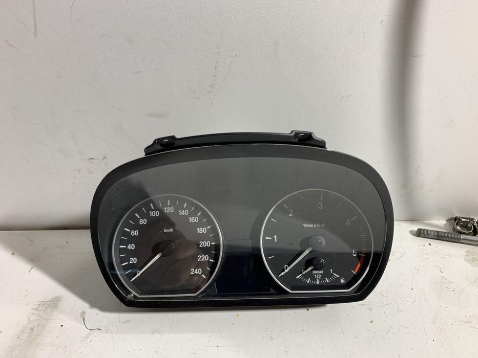 Ceasuri bord bmw seria 1 E87 E81 cod 9141475